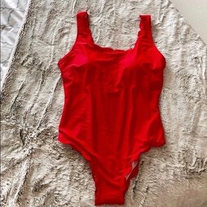 NWOT red one piece with scalloped edge